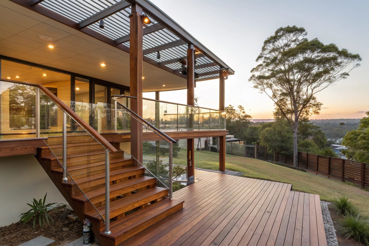 A large elevated spotted gum timber deck on a sloping block